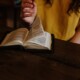 Photo of a person reading a book